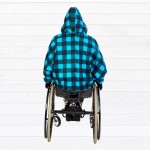 Cape | Manteau d'enfant unisexe adapté pour fauteuil roulant.
